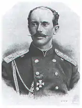 gravure noir et blanc : portrait d'un homme moustachu en unifome