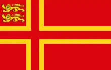 Croix de Saint-Olaf incorporant les léopards normands. Drapeau visible à Falaise, ville natale de Guillaume le Conquérant.