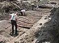Fouilles sur un chemin de rondins datant du XVIe siècle.