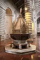 Les fonts baptismaux.