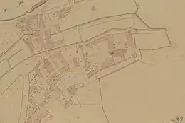 Image en couleurs représentant le plan au sol de constructions urbaines.