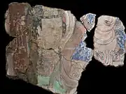 Couple richement paré. Scène de la prédication du Buddha. Kucha, Duldur-āqur. Xinjiang. Peinture murale, début du VIe&nbsp;siècle. Musée Guimet, Paris.