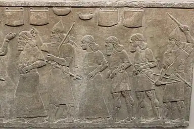 Prisonniers et butin, bas-relief du Palais Nord-Ouest de Nimroud. British Museum.