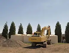 installation de cuves de récupération de l'eau de pluie.