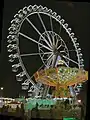 Une grande roue de nuit