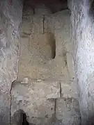 Photographie en couleurs de grands blocs d'agglomérat volcanique.