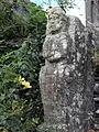 Atlante près du calvaire du bourg près de l'église Saint-Séverin de Saint-Ségal.