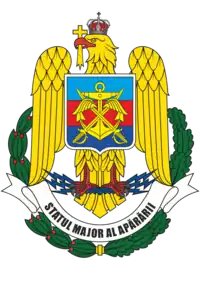 Armoiries de l'état major des trois armes (bleu-ciel : air, rouge : terre, bleu-mer : marine)