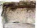 Une grotte aux murs recouverts d'huîtres (mai&nbsp;2009)