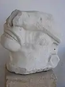 Tête de taureau (ou de veau) attaqué par un lion (A1184). IIe&nbsp;siècle&nbsp;av. J.-C.