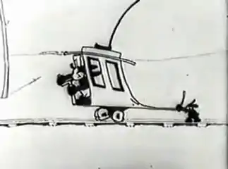 Le wagon d'Oswald est déformé par quelqu'un qui le retient.