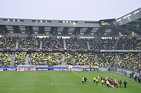 Photo de la présentation des équipes lors du match PSG-Quevilly en 2010.