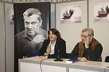 Saša Milenić et l'écrivain Vidosav Stevanović à la Foire internationale du livre de Belgrade en 2008