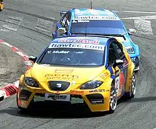 Photo d'Yvan Muller, pilotant une Seat.