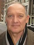 Zach Grenier interprète de David Lee