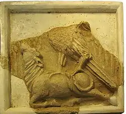 Stuc représentant un cheval.